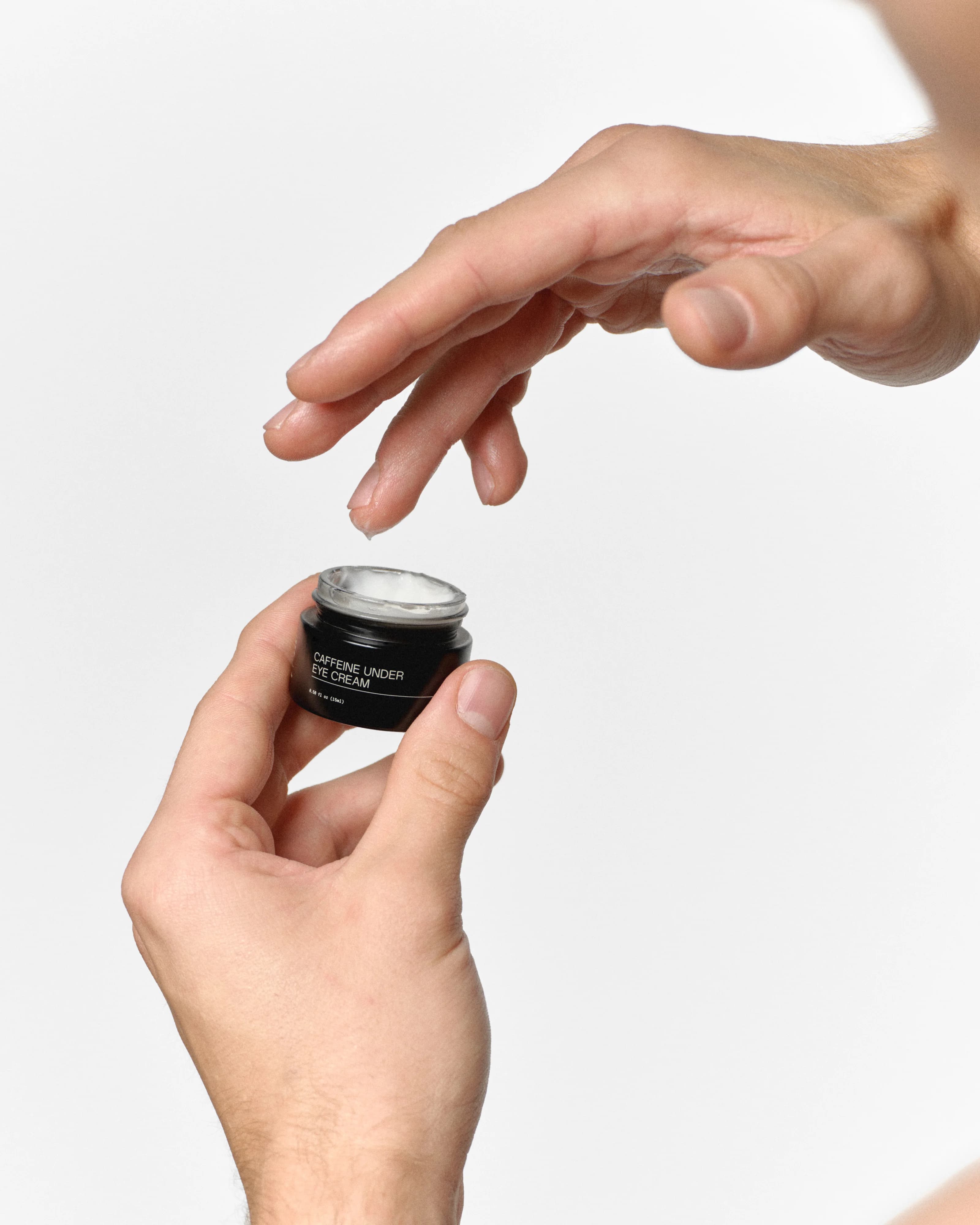 RAWDOG Caffeine Under Eye Cream application