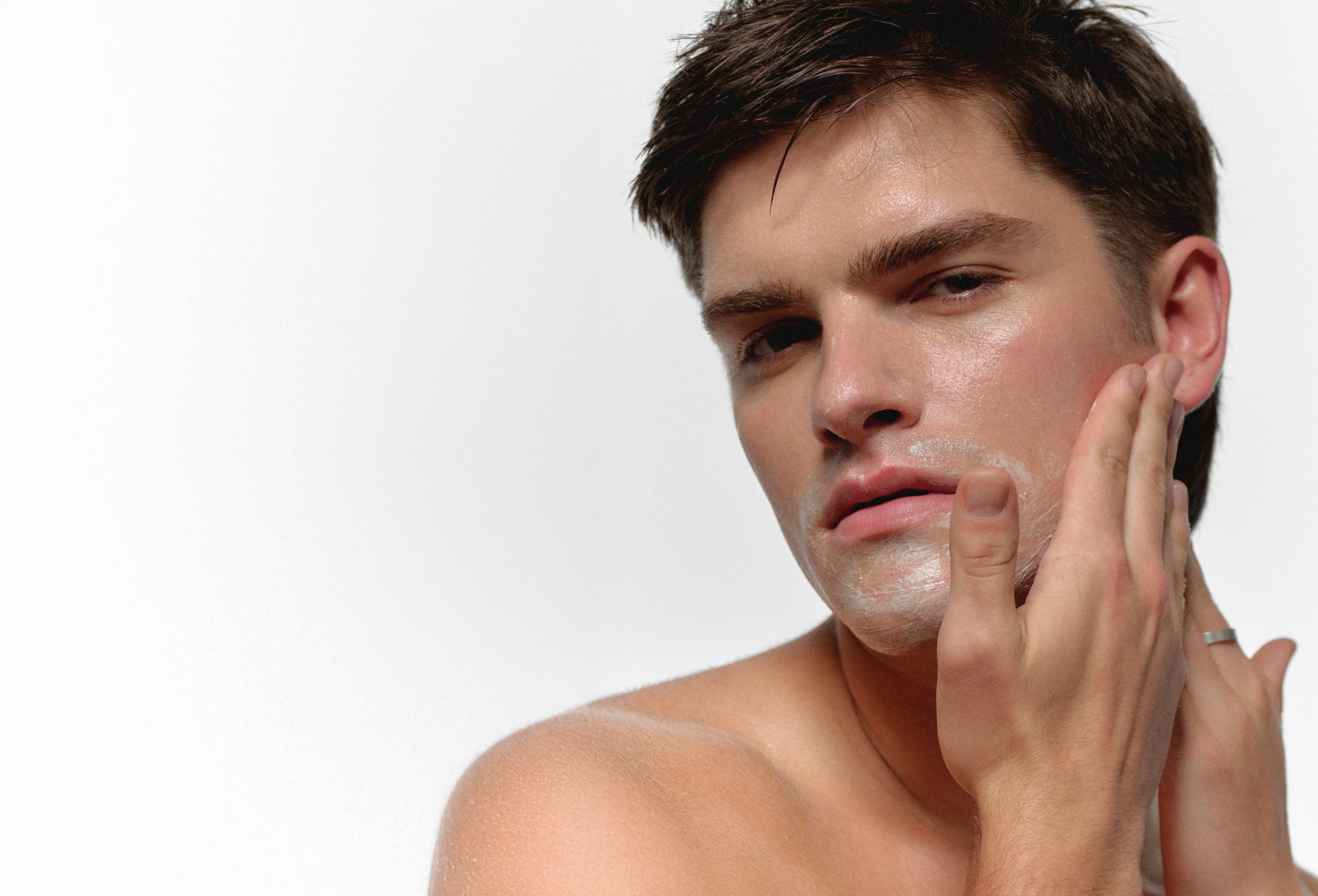 Hand with RAWDOG cleanser product