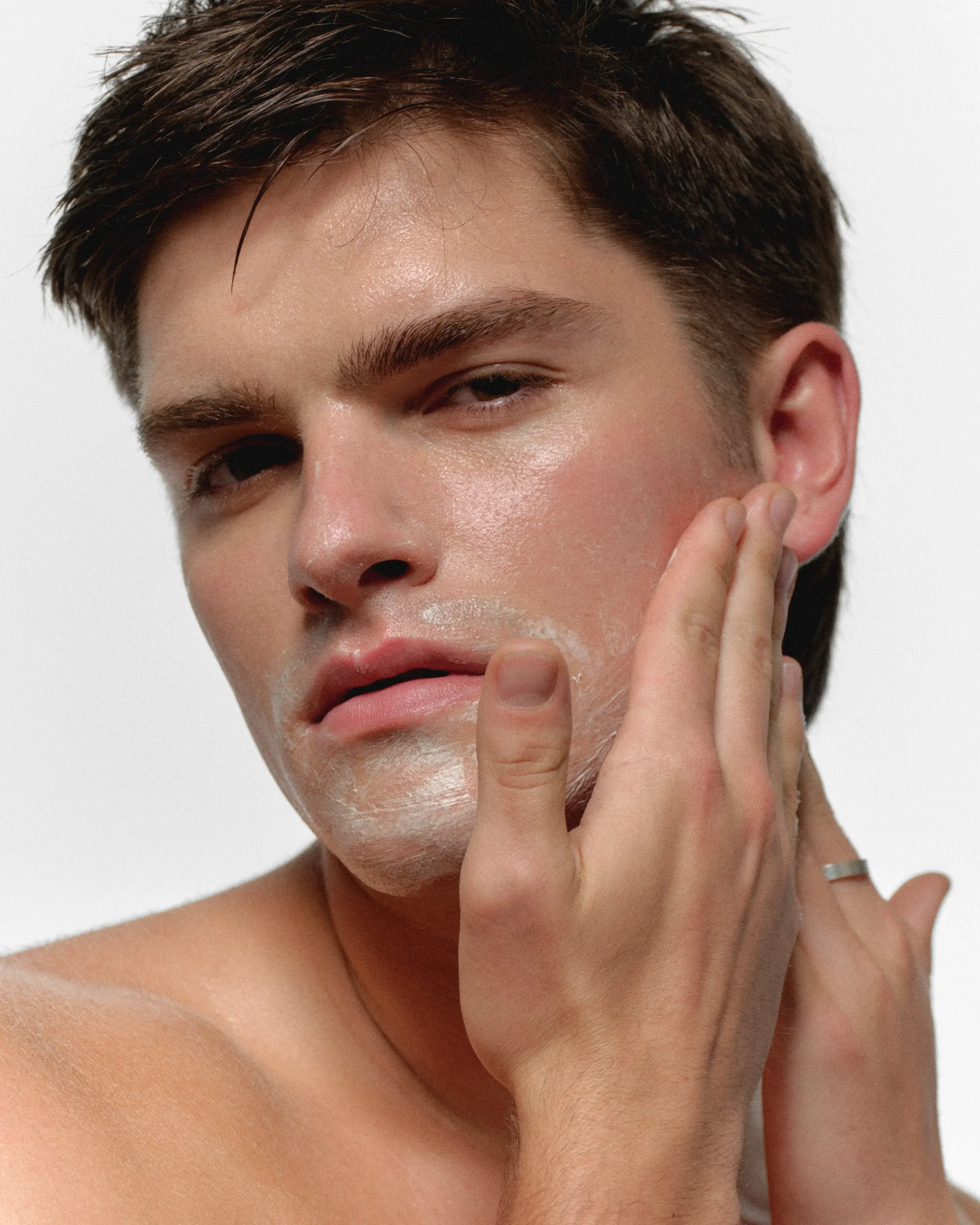 Man with healthy, confident skin after using the RAWDOG Core Set