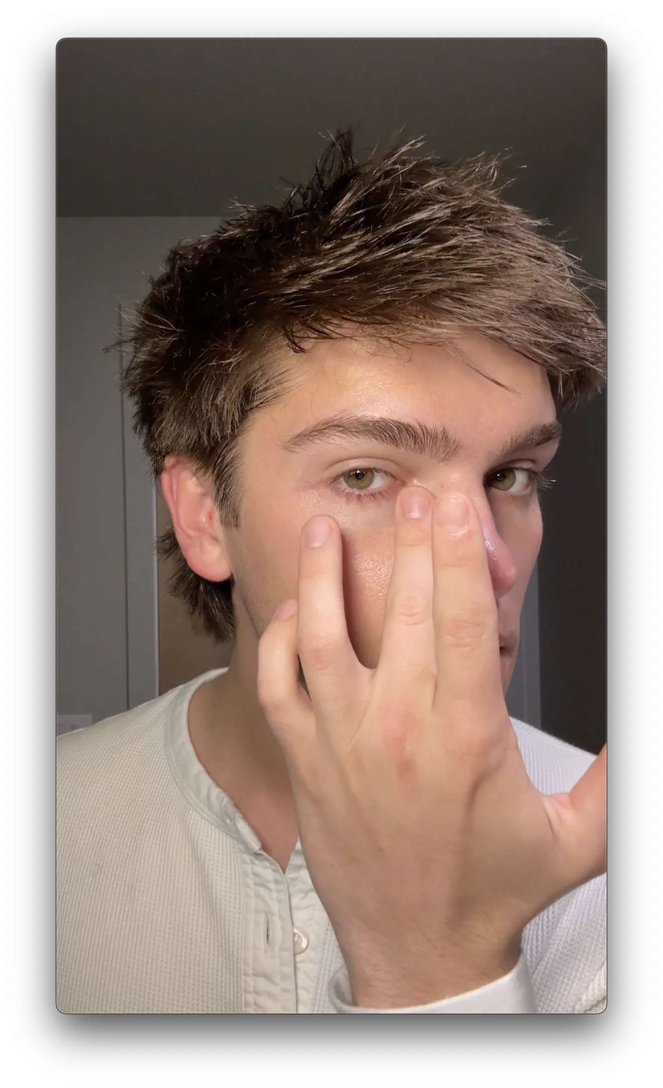 Customer applying RAWDOG eye cream